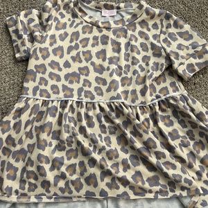 Pink Lily size small leopard peplum top